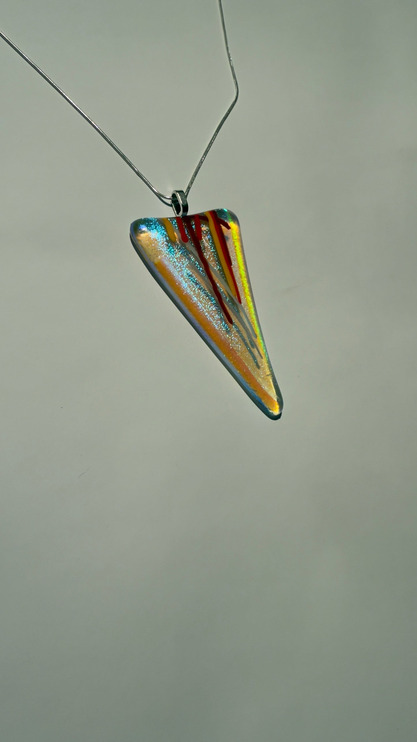 Sweeping Triangle Pendant with Dichroic Glow and Fiery Stringers