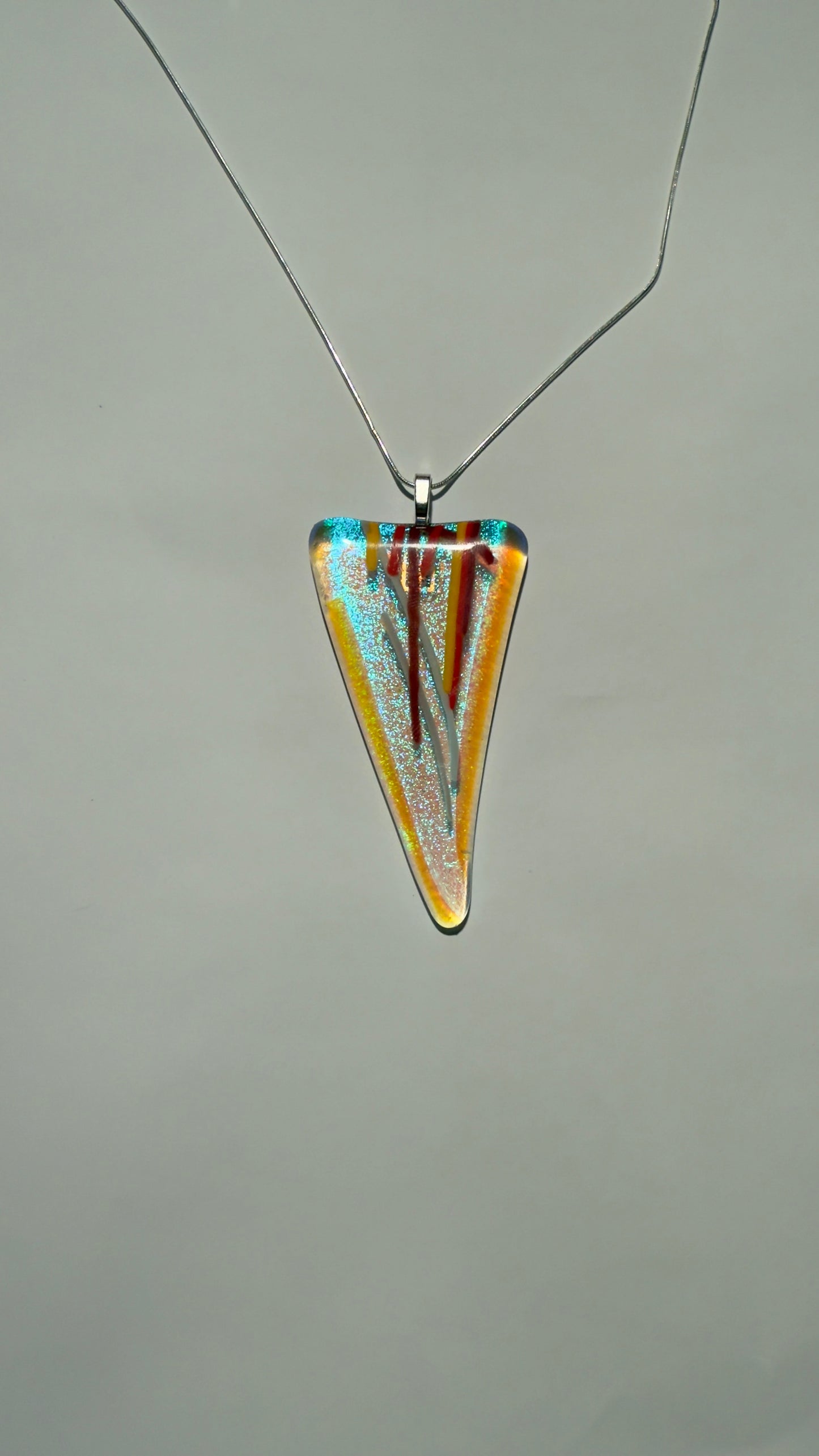 Sweeping Triangle Pendant with Dichroic Glow and Fiery Stringers
