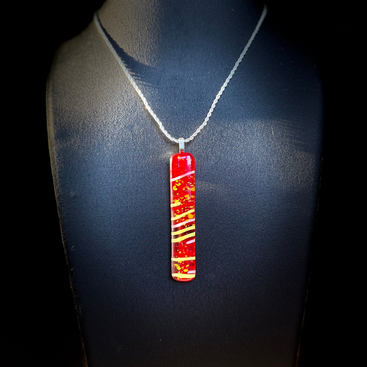 Red Antique glass pendant with Yellow stringers
