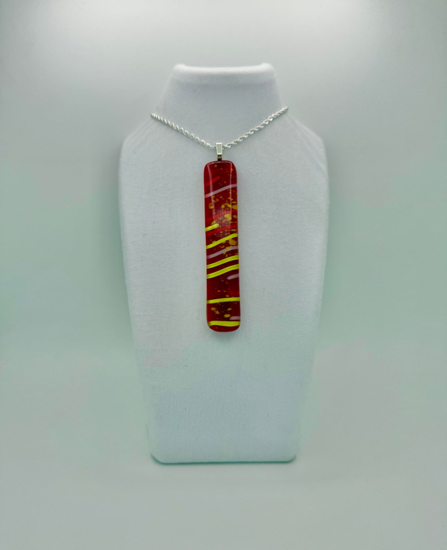 Red Antique glass pendant with Yellow stringers