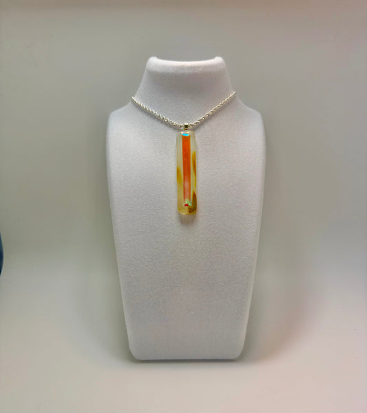 Blue Green dichroic glass fused over rich Amber Antique glass