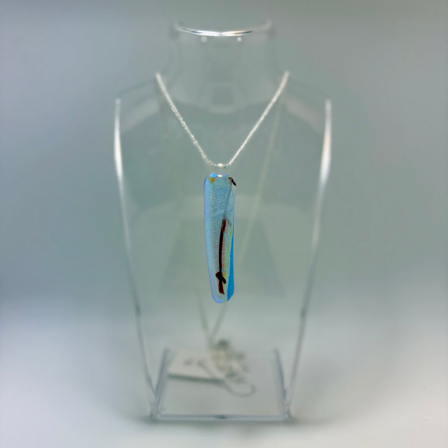 Pale Blue Clear Antique glass pendant with Teal Dichroic and Firelight and Maroon Stringers