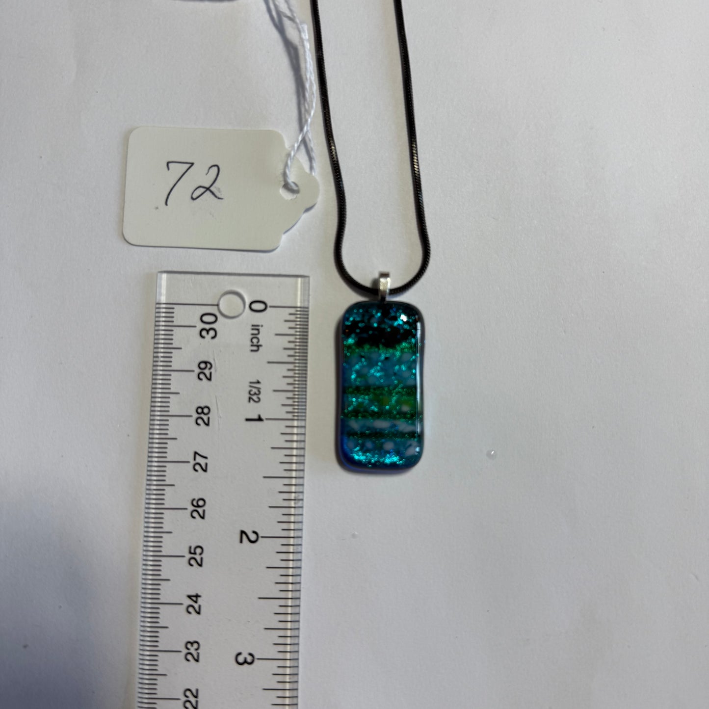 Clear Spectrum glass with Translucent Green Strings and Firelight/Black frit